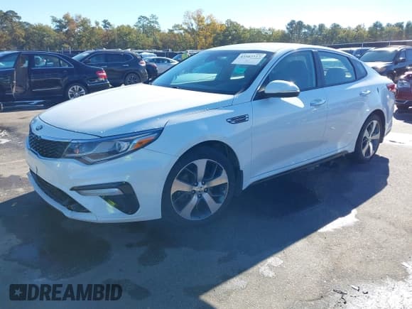 ✅ 2020 Kia Optima LX • VIN: 5XXGT4L36LG416933 • Lot: 43583517. Listed on IAAI with 70,764 mi. Free auction sales archive from the USA and detailed vehicle history report at DreamBid. Image 2.