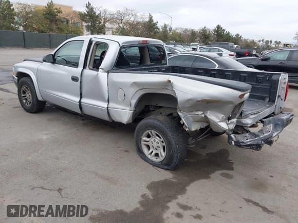 ✅ 2003 Dodge Dakota SLT • VIN: 1D7HL42X83S269082 • Lot: 41890813. Wystawiony na IAAI z przebiegiem Nie podano. Bezpłatny archiwum sprzedaży aukcyjnych z USA i szczegółowy raport historii pojazdu na DreamBid. Zdjęcie 3.
