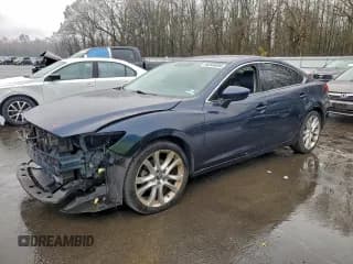 ✅ 2015 Mazda 6 i Touring • VIN: JM1GJ1V55F1200347 • Lot: 94344095. Listed on Copart with 77,483 mi. Free auction sales archive from the USA and detailed vehicle history report at DreamBid. Image 1.