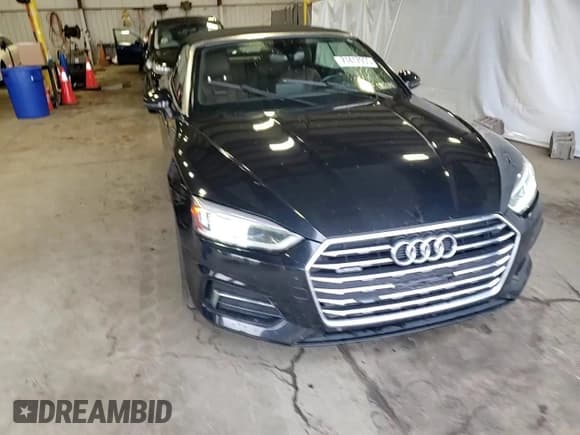 ✅ 2019 Audi A5 Cabriolet Premium • VIN: WAUWNGF57KN001463 • Лот: 71417955. Опубликован ранее на Copart с пробегом 73 403 миль. Бесплатный доступ к архиву аукционных продаж из США и подробный отчёт об истории автомобиля на DreamBid. Изображение 13.