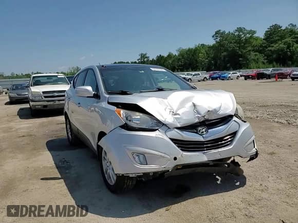 2013 Hyundai Tucson Limited z VIN KM8JUCAC9DU557664, wystawiony jako Copart lot #53707934 z przebiegiem 148 967 mil mil oraz Szkoda całkowita • Salvage title. Historia ofert i sprzedaży dostępna na DreamBid. Obrazek 12.