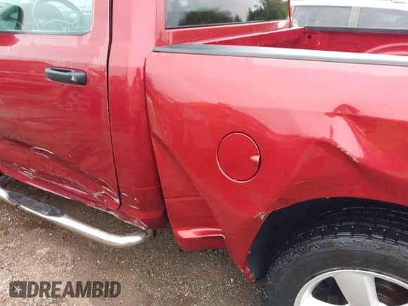 2013 Ram 1500 Express z VIN 3C6JR6ATXDG572482, wystawiony jako IAAI lot #42891027 z przebiegiem 144 622 mil mil oraz . Historia ofert i sprzedaży dostępna na DreamBid. Obrazek 6.