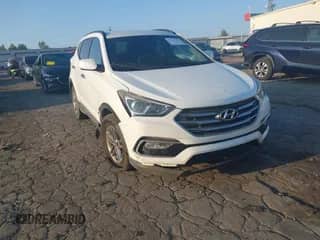 2017 Hyundai Santa Fe 2.4L z VIN 5NMZUDLBXHH032305, wystawiony jako IAAI lot #43267307 z przebiegiem 139 069 mil mil oraz . Historia ofert i sprzedaży dostępna na DreamBid. Obrazek 1.