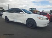 ✅ 2002 Toyota Camry XLE • VIN: JTDBE30K020102592 • Lot: 82474535. Wystawiony na Copart z przebiegiem 142 701 mil. Bezpłatny archiwum sprzedaży aukcyjnych z USA i szczegółowy raport historii pojazdu na DreamBid. Zdjęcie 4.