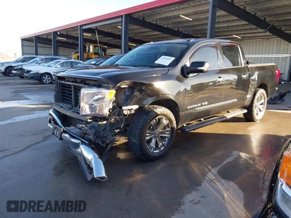 ✅ 2018 Nissan Titan Pro-4X • VIN: 1N6AA1E52JN511884 • Lot: 43594095. Listed on IAAI with 122,006 mi. Free auction sales archive from the USA and detailed vehicle history report at DreamBid. Image 2.