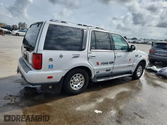 ✅ 1999 Lincoln Navigator • VIN: 5LMRU27L4XLJ08727 • Lot: 84951505. Listed on Copart with Not provided. Free auction sales archive from the USA and detailed vehicle history report at DreamBid. Image 3.