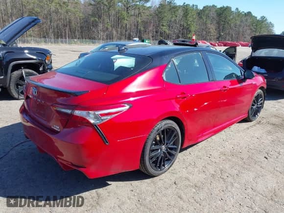2021 Toyota Camry Hybrid XSE with VIN 4T1K31AK8MU023364, listed as a IAAI auction lot 41752259 with 97,143 mi miles and . Bid and sale history available at DreamBid. Image 4.