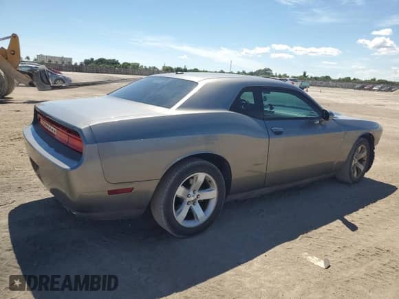 2012 Dodge Challenger SXT z VIN 2C3CDYAG7CH180240, wystawiony jako Copart lot #73298884 z przebiegiem 165 005 mil mil oraz Szkoda całkowita • Salvage title. Historia ofert i sprzedaży dostępna na DreamBid. Obrazek 3.