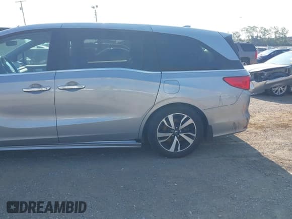 ✅ 2020 Honda Odyssey Elite • VIN: 5FNRL6H97LB059945 • Лот: 39965636. Опубликован ранее на IAAI с пробегом 52 123 миль. Бесплатный доступ к архиву аукционных продаж из США и подробный отчёт об истории автомобиля на DreamBid. Изображение 6.
