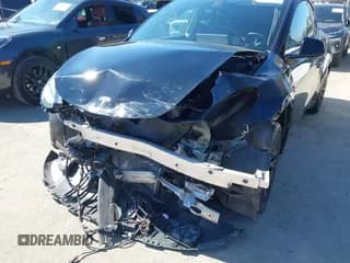 ✅ 2022 Tesla Model Y Long Range • VIN: 7SAYGDEE8NF346352 • Lot: 42649343. Listed on IAAI with 36,799 mi. Free auction sales archive from the USA and detailed vehicle history report at DreamBid. Image 6.