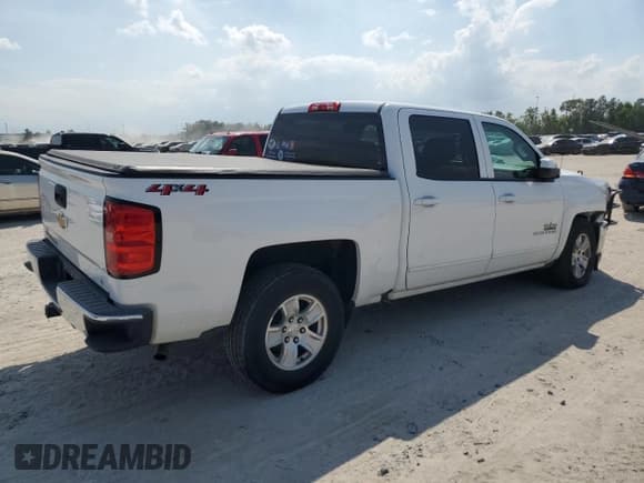 ✅ 2018 Chevrolet Silverado 1500 LT • VIN: 3GCUKREC8JG601897 • Лот: 72721394. Опубликован ранее на Copart с пробегом 143 452 миль. Бесплатный доступ к архиву аукционных продаж из США и подробный отчёт об истории автомобиля на DreamBid. Изображение 3.