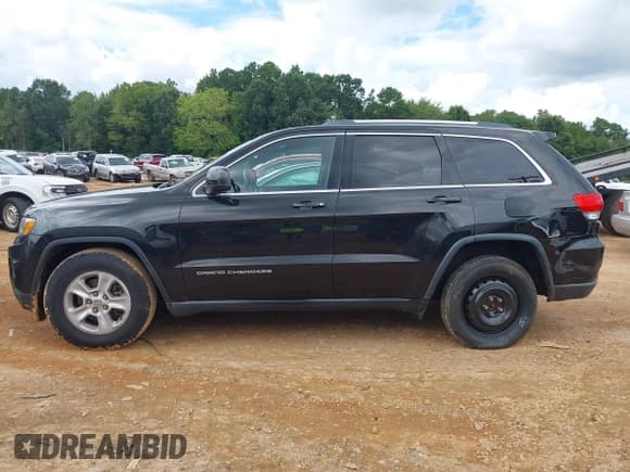 ✅ 2015 Jeep Grand Cherokee Laredo • VIN: 1C4RJEAG0FC125942 • Лот: 42986978. Опубликован ранее на IAAI с пробегом 158 072 миль. Бесплатный доступ к архиву аукционных продаж из США и подробный отчёт об истории автомобиля на DreamBid. Изображение 15.