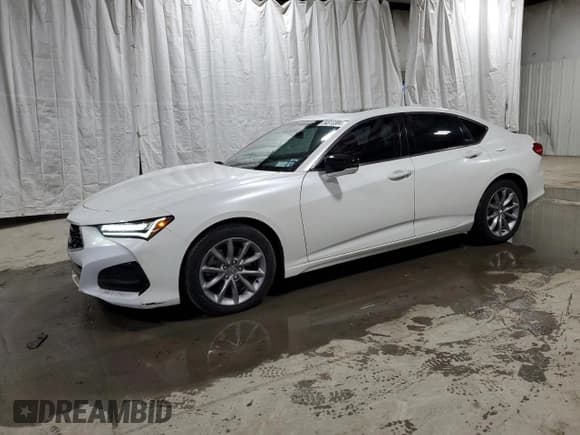 ✅ 2022 Acura TLX • VIN: 19UUB5F34NA000029 • Лот: 84613304. Опубликован ранее на Copart с пробегом 28 464 миль. Бесплатный доступ к архиву аукционных продаж из США и подробный отчёт об истории автомобиля на DreamBid. Изображение 1.