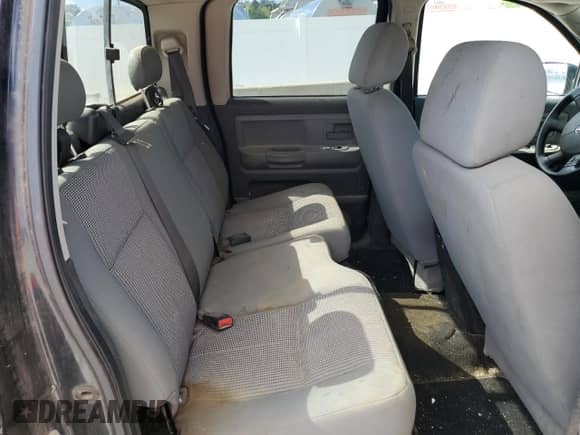 2008 Dodge Dakota SLT z VIN 1D7HE48KX8S501744, wystawiony jako Copart lot #74484394 z przebiegiem 189 083 mil mil oraz Czysty tytuł • Clean title. Historia ofert i sprzedaży dostępna na DreamBid. Obrazek 10.