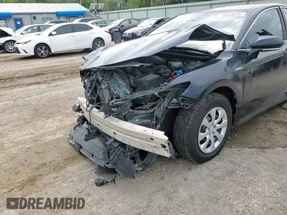 2021 Toyota Camry Hybrid LE with VIN 4T1C31AK9MU562662, listed as a Copart auction lot 70874675 with 197,127 mi miles and Salvage title. Bid and sale history available at DreamBid. Image 14.