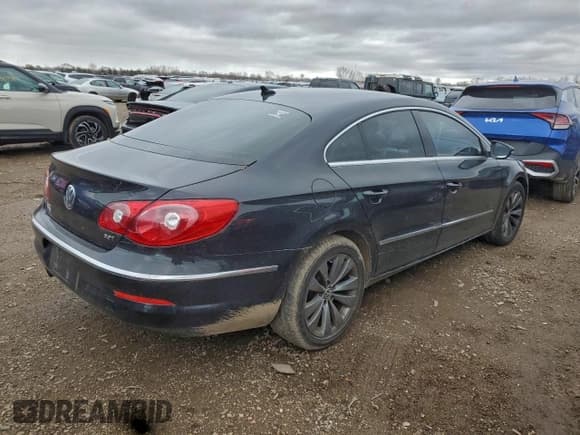 ✅ 2012 Volkswagen CC Sport • VIN: WVWNN7AN5CE520132 • Lot: 94264715. Listed on Copart with 156,334 mi. Free auction sales archive from the USA and detailed vehicle history report at DreamBid. Image 3.