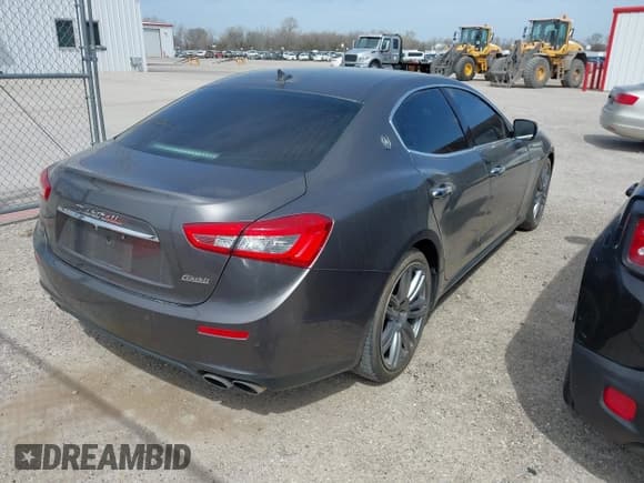 ✅ 2016 Maserati Ghibli • VIN: ZAM57XSAXG1176277 • Lot: 41815072. Listed on IAAI with 79,236 mi. Free auction sales archive from the USA and detailed vehicle history report at DreamBid. Image 4.
