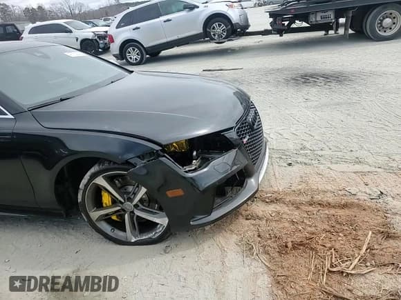 ✅ 2015 Audi RS 7 • VIN: WUAW2CFC0FN900483 • Лот: 47700525. Опубликован ранее на Copart с пробегом 107 260 миль. Бесплатный доступ к архиву аукционных продаж из США и подробный отчёт об истории автомобиля на DreamBid. Изображение 11.