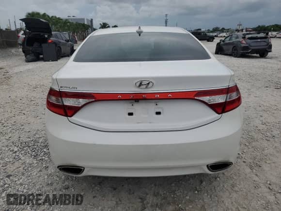 2014 Hyundai Azera с VIN KMHFG4JG3EA351748, выставлен на аукционе Copart как лот 60637765 с пробегом 110 377 миль миль и Списание • Salvage title. История ставок и продаж доступна на DreamBid. Изображение 6.