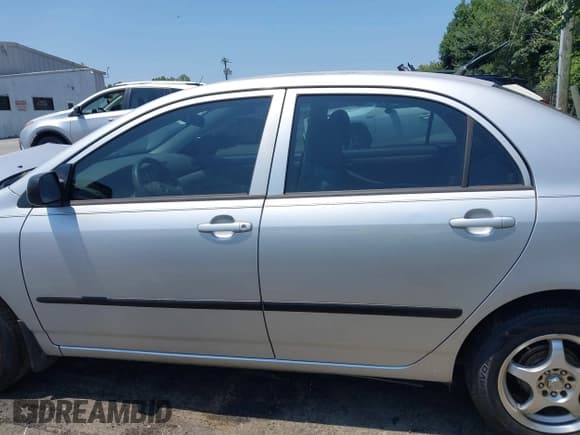 ✅ 2005 Toyota Corolla CE • VIN: JTDBR32E250055971 • Lot: 42660536. Listed on IAAI with 299,999 mi. Free auction sales archive from the USA and detailed vehicle history report at DreamBid. Image 14.