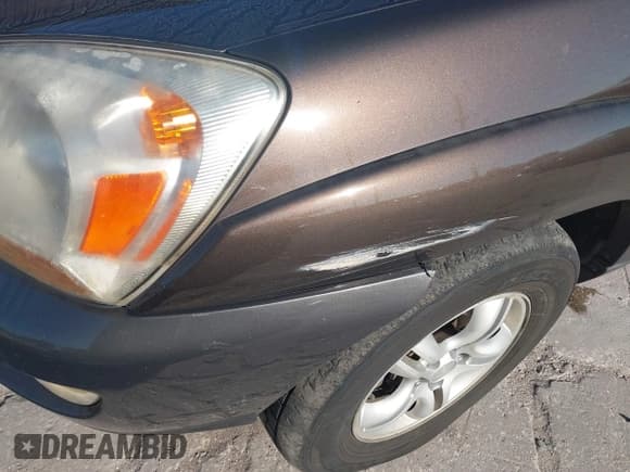 ✅ 2005 Kia Sportage LX • VIN: KNDJF723757132772 • Lot: 41436925. Listed on IAAI with 134,653 mi. Free auction sales archive from the USA and detailed vehicle history report at DreamBid. Image 6.