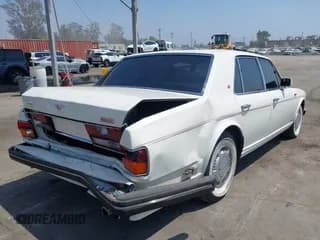 ✅ 1990 Bentley Turbo R • VIN: SCBZR03DXLCX32699 • Lot: 42960582. Wystawiony na IAAI z przebiegiem 38 147 mil. Bezpłatny archiwum sprzedaży aukcyjnych z USA i szczegółowy raport historii pojazdu na DreamBid. Zdjęcie 4.