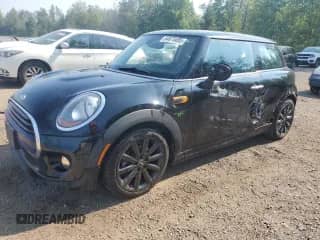2016 MINI Hardtop with VIN WMWXP5C58G2D15190, listed as a Copart auction lot 64673485 with 146,964 mi miles and Clean title. Bid and sale history available at DreamBid. Image 1.