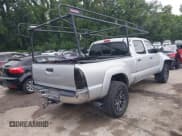 ✅ 2013 Toyota Tacoma • VIN: 3TMMU4FN1DM054202 • Lot: 42871926. Listed on IAAI with 270,648 mi. Free auction sales archive from the USA and detailed vehicle history report at DreamBid. Image 4.