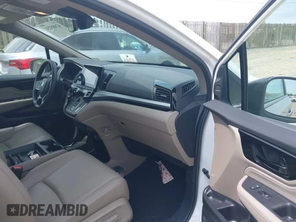 ✅ 2023 Honda Odyssey Touring • VIN: 5FNRL6H84PB072746 • Lot: 42085251. Listed on IAAI with 17,247 mi. Free auction sales archive from the USA and detailed vehicle history report at DreamBid. Image 5.