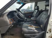 ✅ 1996 Jeep Grand Cherokee Limited • VIN: 1J4EZ78YXTC122036 • Lot: 70358055. Listed on Copart with 185,601 mi. Free auction sales archive from the USA and detailed vehicle history report at DreamBid. Image 7.