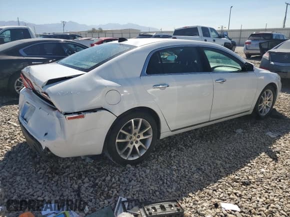 ✅ 2012 Chevrolet Malibu LTZ • VIN: 1G1ZG5E71CF130336 • Lot: 69080004. Listed on Copart with 168,690 mi. Free auction sales archive from the USA and detailed vehicle history report at DreamBid. Image 3.