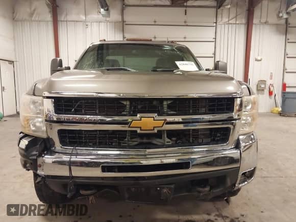 2007 Chevrolet Silverado 2500HD LTZ z VIN 1GCHK29617E595261, wystawiony jako IAAI lot #42846735 z przebiegiem 257 925 mil mil oraz . Historia ofert i sprzedaży dostępna na DreamBid. Obrazek 13.