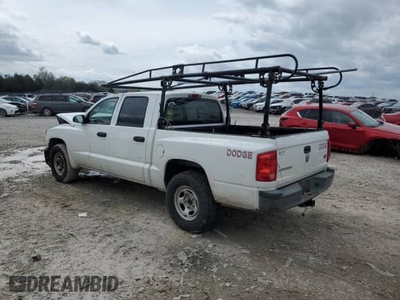 ✅ 2006 Dodge Dakota ST • VIN: 1D7HE28N26S701982 • Лот: 51218215. Размещён на Copart с пробегом 169 678 миль миль. Получите бесплатный доступ к архиву аукционных продаж из США и посмотрите подробный отчёт об истории автомобиля на DreamBid. Изображение 2.