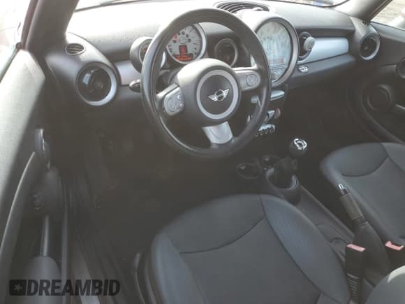 ✅ 2009 MINI Convertible • VIN: WMWMR33589TJ94303 • Lot: 43358885. Listed on Copart with 44,688 mi. Free auction sales archive from the USA and detailed vehicle history report at DreamBid. Image 8.