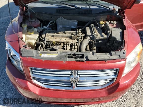 ✅ 2010 Dodge Caliber SXT • VIN: 1B3CB4HA5AD613982 • Лот: 76818044. Опубликован ранее на Copart с пробегом 165 797 миль. Бесплатный доступ к архиву аукционных продаж из США и подробный отчёт об истории автомобиля на DreamBid. Изображение 12.