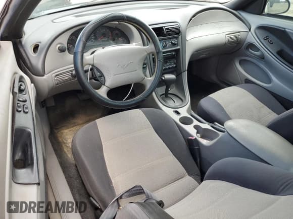 ✅ 2002 Ford Mustang Standard • VIN: 1FAFP40442F218397 • Lot: 82153245. Listed on Copart with 183,356 mi. Free auction sales archive from the USA and detailed vehicle history report at DreamBid. Image 8.