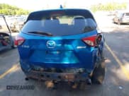 ✅ 2014 Mazda CX-5 Sport • VIN: JM3KE2BE7E0332563 • Lot: 42770891. Listed on IAAI with 145,924 mi. Free auction sales archive from the USA and detailed vehicle history report at DreamBid. Image 17.