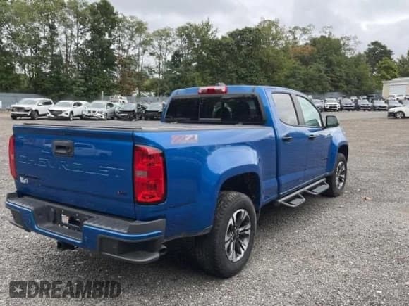 ✅ 2022 Chevrolet Colorado 4WD Z71 • VIN: 1GCGTDEN1N1200985 • Лот: 78962434. Опубликован ранее на Copart с пробегом 27 439 миль. Бесплатный доступ к архиву аукционных продаж из США и подробный отчёт об истории автомобиля на DreamBid. Изображение 4.