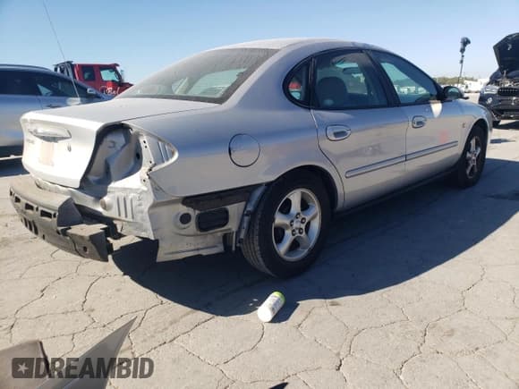 ✅ 2000 Ford Taurus SES • VIN: 1FAFP55S7YA255138 • Lot: 86819025. Listed on Copart with 23,468 mi. Free auction sales archive from the USA and detailed vehicle history report at DreamBid. Image 3.