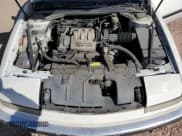 ✅ 1991 Buick Reatta • VIN: 1G4EC13L2MB900929 • Lot: 47276075. Wystawiony na Copart z przebiegiem 91 618 mil. Bezpłatny archiwum sprzedaży aukcyjnych z USA i szczegółowy raport historii pojazdu na DreamBid. Zdjęcie 11.