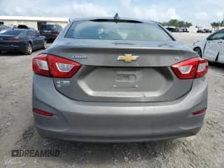 ✅ 2018 Chevrolet Cruze LT • VIN: 1G1BE5SM0J7129249 • Lot: 58995413. Listed on Copart with Not provided. Free auction sales archive from the USA and detailed vehicle history report at DreamBid. Image 6.