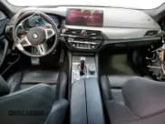 ✅ 2022 BMW M5 • VIN: WBS83CH06NCH65232 • Lot: 85136335. Listed on Copart with 24,615 mi. Free auction sales archive from the USA and detailed vehicle history report at DreamBid. Image 8.