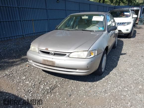 ✅ 1999 Toyota Corolla VE • VIN: 2T1BR12E1XC141396 • Lot: 42969365. Listed on IAAI with 215,831 mi. Free auction sales archive from the USA and detailed vehicle history report at DreamBid. Image 2.