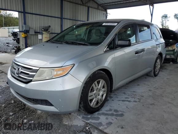 ✅ 2013 Honda Odyssey LX • VIN: 5FNRL5H27DB052198 • Lot: 85646085. Listed on Copart with 130,530 mi. Free auction sales archive from the USA and detailed vehicle history report at DreamBid. Image 1.