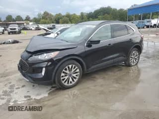 ✅ 2021 Ford Escape Titanium • VIN: 1FMCU9J97MUA71094 • Lot: 84000995. Listed on Copart with 93,801 mi. Free auction sales archive from the USA and detailed vehicle history report at DreamBid. Image 1.