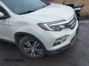 ✅ 2018 Honda Pilot EX-L • VIN: 5FNYF6H79JB029229 • Лот: 41459545. Опубликован ранее на IAAI с пробегом 95 107 миль. Бесплатный доступ к архиву аукционных продаж из США и подробный отчёт об истории автомобиля на DreamBid. Изображение 6.