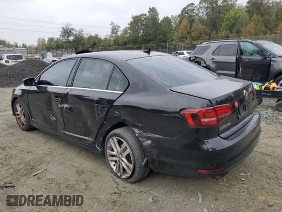 ✅ 2017 Volkswagen Jetta SEL • VIN: 3VWL17AJXHM265184 • Лот: 82380445. Опубликован ранее на Copart с пробегом 186 331 миль. Бесплатный доступ к архиву аукционных продаж из США и подробный отчёт об истории автомобиля на DreamBid. Изображение 2.