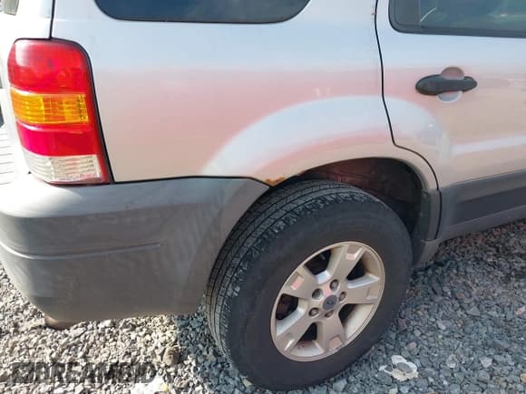 ✅ 2005 Ford Escape XLT • VIN: 1FMCU93125KA25998 • Lot: 42413196. Listed on IAAI with 192,490 mi. Free auction sales archive from the USA and detailed vehicle history report at DreamBid. Image 6.