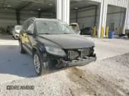 ✅ 2012 Volkswagen Tiguan S • VIN: WVGBV7AX6CW562562 • Lot: 87060975. Listed on Copart with 179,456 mi. Free auction sales archive from the USA and detailed vehicle history report at DreamBid. Image 15.