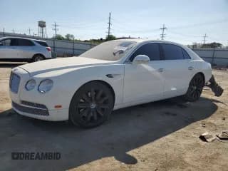 ✅ 2014 Bentley Flying Spur • VIN: SCBEC9ZA1EC091219 • Лот: 70480844. Опубликован ранее на Copart с пробегом 64 404 миль. Бесплатный доступ к архиву аукционных продаж из США и подробный отчёт об истории автомобиля на DreamBid. Изображение 1.